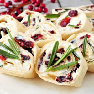 Cheesy Cranberry Pinwheels make a perfect finger food to have on hand. They are simple to prepare and make a lovely presentation. My Medical Medium® friendly version will have people coming back for seconds.