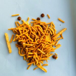 Typically sev is deep fried. Here is a super clean and healthy baked version - snacking sev. You can snack on this as it is, or you can use it as a topping on chaat.
