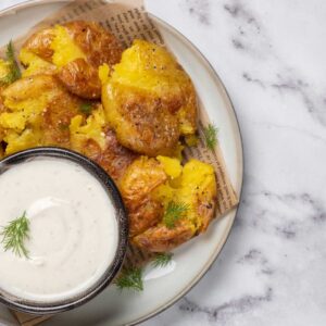 herbed smashed potatoes cashew cheese feature image