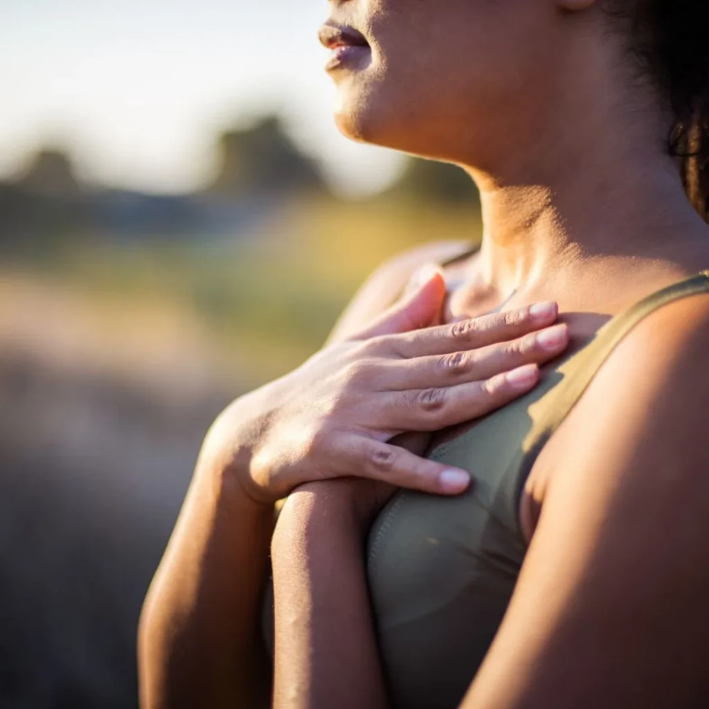 Held by the moon participant with hands on chest
